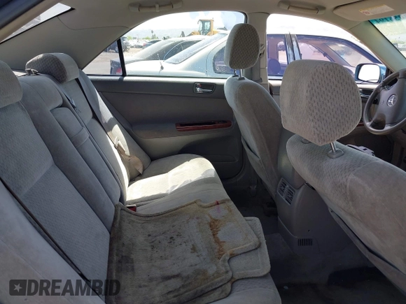 2003 Toyota Camry LE with VIN 4T1BE32KX3U682520, listed as a IAAI auction lot 42056194 with 116,969 mi miles and . Bid and sale history available at DreamBid. Image 8.