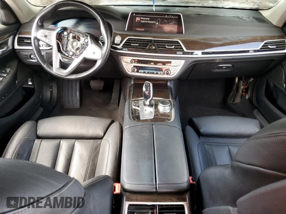 2020 BMW 7 Series 740i z VIN WBA7T2C06LGL17660, wystawiony jako Copart lot #57347885 z przebiegiem Nie podano mil oraz Tytuł czysty. Historia ofert i sprzedaży dostępna na DreamBid. Obrazek 8.