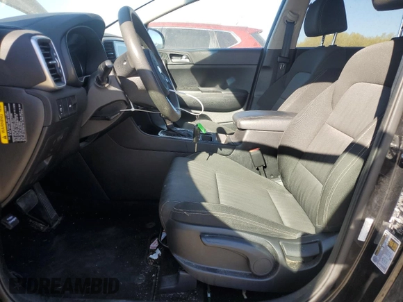 2020 Kia Sportage LX with VIN KNDPM3AC1L7736860, listed as a Copart auction lot 50317285 with 114,281 mi miles and Salvage Title. Bid and sale history available at carsss.com. Image 7.