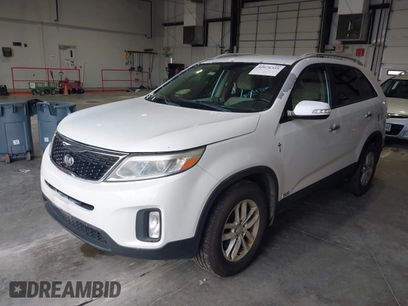 2015 Kia Sorento LX with VIN 5XYKTDA75FG653090, listed as a IAAI auction lot 42676355 with 153,476 mi miles and . Bid and sale history available at DreamBid. Image 2.