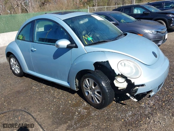 2010 Volkswagen New Beetle Coupe with VIN 3VWRW3AG2AM018644, listed as a IAAI auction lot 41815380 with 99,738 mi miles. Bid and sale history available at carsss.com. Image 1.