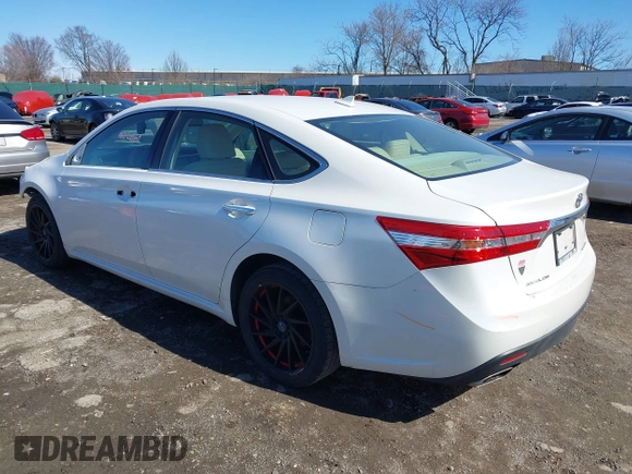 2013 Toyota Avalon XLE with VIN 4T1BK1EB3DU014472, listed as a IAAI auction lot 41826245 with 151,522 mi miles and . Bid and sale history available at DreamBid. Image 3.