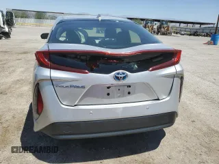 2017 Toyota Prius Plus z VIN JTDKARFP3H3017836, wystawiony jako Copart lot #57613355 z przebiegiem 64 958 mil mil oraz Szkoda całkowita • Salvage title. Historia ofert i sprzedaży dostępna na DreamBid. Obrazek 6.