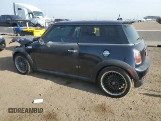 2009 MINI Hardtop S with VIN WMWMF73599TT94509, listed as a Copart auction lot 53495645 with Not provided miles and Salvage title. Bid and sale history available at DreamBid. Image 2.