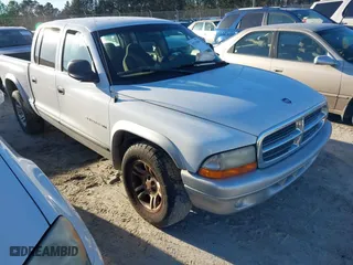 2002 Dodge Dakota SLT with VIN 1B7HL48N72S586317, listed as a IAAI auction lot 41736566 with 1 mi miles. Bid and sale history available at carsss.com. Image 1.