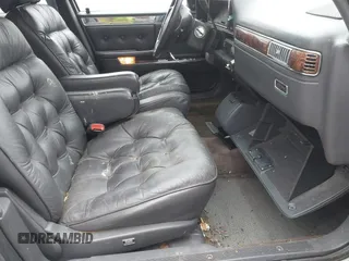 1992 Chrysler New Yorker z VIN 1C3XV66L3ND861794, wystawiony jako IAAI lot #41844564 z przebiegiem 68 016 mil mil oraz . Historia ofert i sprzedaży dostępna na DreamBid. Obrazek 5.