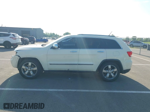 2011 Jeep Grand Cherokee Overland with VIN 1J4RR6GT2BC631909, listed as a IAAI auction lot 42564356 with 205,954 mi miles and . Bid and sale history available at DreamBid. Image 14.