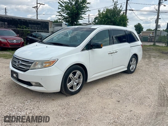 2011 Honda Odyssey Touring с VIN 5FNRL5H92BB008426, выставлен на аукционе Copart как лот 59419585 с пробегом 245 087 миль миль и Чистый • Clean title. История ставок и продаж доступна на DreamBid. Изображение 2.