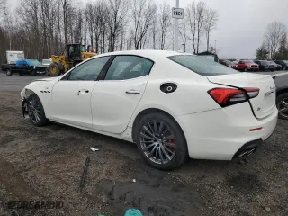 2023 Maserati Ghibli Modena Q4 with VIN ZAM57YTM5PX419828, listed as a Copart auction lot 48573354 with 12,261 mi miles. Bid and sale history available at carsss.com. Image 2.