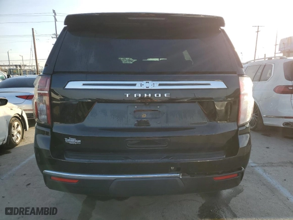 2021 Chevrolet Tahoe LS with VIN 1GNSCMKD5MR230455, listed as a Copart auction lot 81622694 with 50,085 mi miles and Salvage Title. Bid and sale history available at carsss.com. Image 6.