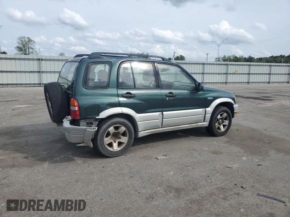 1999 Suzuki Grand Vitara JLX z VIN JS3TD62V0X4124366, wystawiony jako Copart lot #50885055 z przebiegiem 204 168 mil mil oraz Szkoda całkowita • Salvage title. Historia ofert i sprzedaży dostępna na DreamBid. Obrazek 3.