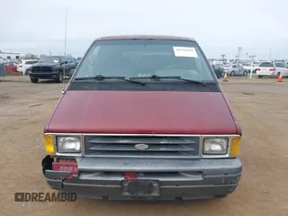 1989 Ford Aerostar with VIN 1FMCA11U2KZC19215, listed as a IAAI auction lot 41719140 with 3,566 mi miles. Bid and sale history available at carsss.com. Image 6.