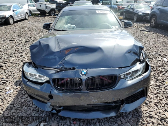 2015 BMW 4 Series 435i xDrive with VIN WBA4B3C51FGV48297, listed as a Copart auction lot 60950394 with 105,509 mi miles and Salvage Title. Bid and sale history available at DreamBid. Image 5.