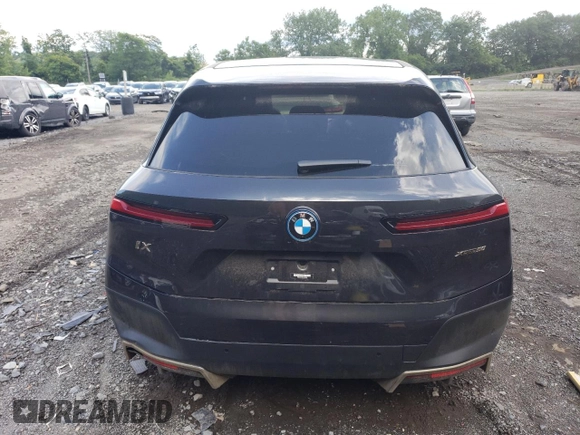 2023 BMW iX xDrive50 with VIN WB523CF05PCL62449, listed as a Copart auction lot 57069783 with 0 mi miles. Bid and sale history available at carsss.com. Image 6.