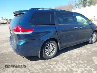 2011 Toyota Sienna XLE AAS with VIN 5TDYK3DCXBS114882, listed as a IAAI auction lot 42007417 with 144,087 mi miles and . Bid and sale history available at DreamBid. Image 4.