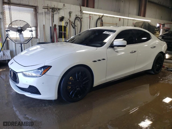 2014 Maserati Ghibli S Q4 with VIN ZAM57RTA4E1117703, listed as a Copart auction lot 48754515 with 104,284 mi miles and Salvage Title. Bid and sale history available at carsss.com. Image 1.