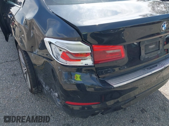 2018 BMW 5 Series 530i with VIN WBAJA5C56JG897692, listed as a IAAI auction lot 41813052 with 37,610 mi miles and . Bid and sale history available at DreamBid. Image 18.