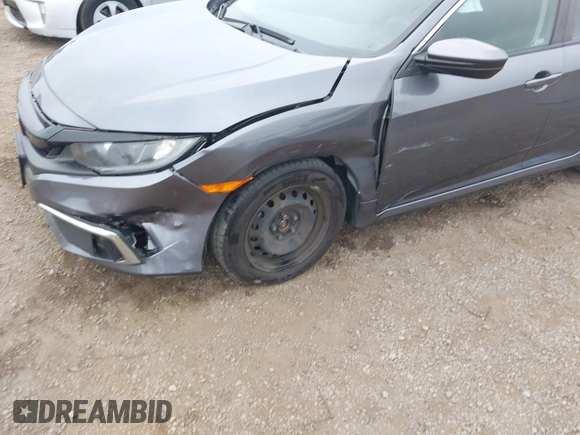 2020 Honda Civic LX with VIN 2HGFC2F63LH567698, listed as a IAAI auction lot 42354886 with 70,977 mi miles and . Bid and sale history available at DreamBid. Image 6.
