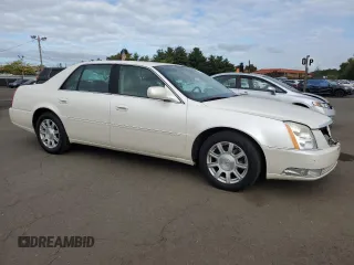 2011 Cadillac DTS z VIN 1G6KA5E61BU104530, wystawiony jako Copart lot #74100794 z przebiegiem 167 373 mil mil oraz Szkoda całkowita • Salvage title. Historia ofert i sprzedaży dostępna na DreamBid. Obrazek 4.