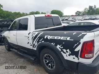 2017 Ram 1500 Rebel with VIN 1C6RR7YT7HS575529, listed as a IAAI auction lot 42125529 with 110,722 mi miles and . Bid and sale history available at DreamBid. Image 14.