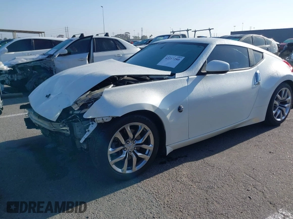 2014 Nissan 370Z Touring with VIN JN1AZ4EH7EM635655, listed as a IAAI auction lot 42217280 with 150,200 mi miles and . Bid and sale history available at DreamBid. Image 2.