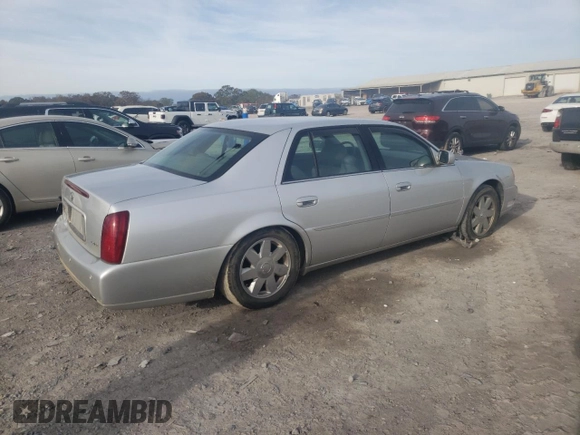 2003 Cadillac DeVille DTS z VIN 1G6KF57973U163124, wystawiony jako Copart lot #78054584 z przebiegiem 111 189 mil mil oraz Szkoda całkowita • Salvage title. Historia ofert i sprzedaży dostępna na DreamBid. Obrazek 3.