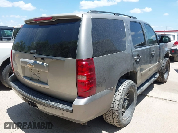 2007 Chevrolet Tahoe LT with VIN 1GNFC13007J405418, listed as a IAAI auction lot 42631830 with 225,156 mi miles and . Bid and sale history available at DreamBid. Image 4.