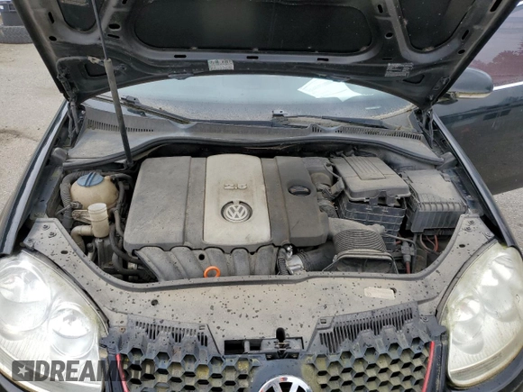 2007 Volkswagen Jetta Wolfsburg Edition z VIN 3VWEF71K67M061788, wystawiony jako Copart lot #57208365 z przebiegiem 184 055 mil mil oraz Szkoda całkowita • Salvage title. Historia ofert i sprzedaży dostępna na DreamBid. Obrazek 11.