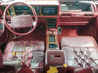 1991 Cadillac Eldorado z VIN 1G6EL13B9MU604115, wystawiony jako Copart lot #52232425 z przebiegiem 95 570 mil mil oraz Szkody całkowita. Historia ofert i sprzedaży dostępna na DreamBid. Obrazek 8.