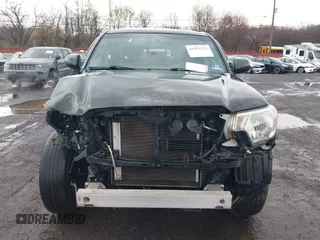 2013 Toyota Tacoma with VIN 3TMLU4EN3DM123470, listed as a IAAI auction lot 41952721 with 72,296 mi miles and . Bid and sale history available at DreamBid. Image 12.