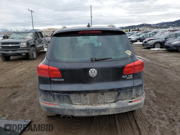 2014 Volkswagen Tiguan SEL with VIN WVGBV3AX2EW596929, listed as a Copart auction lot 46267875 with Not provided miles and Salvage title. Bid and sale history available at DreamBid. Image 6.