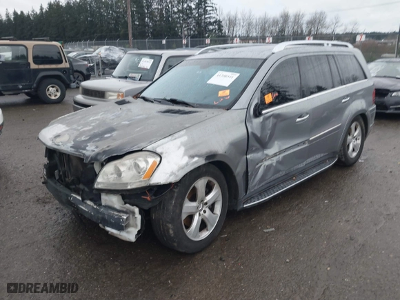 2010 Mercedes-Benz GL-Class GL 450 with VIN 4JGBF7BE5AA587487, listed as a IAAI auction lot 41208541 with 1 mi miles. Bid and sale history available at carsss.com. Image 2.