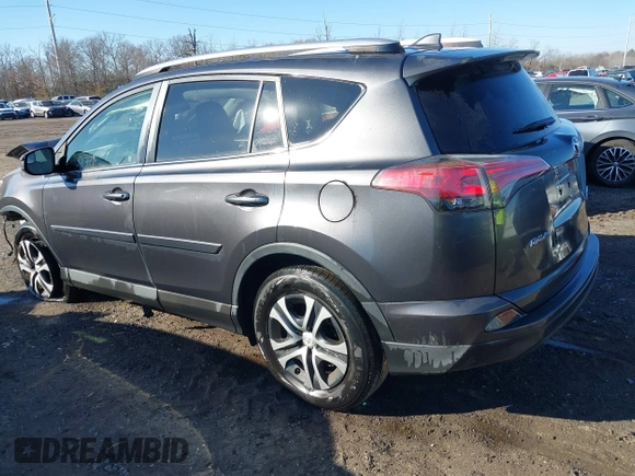 2016 Toyota RAV4 LE with VIN JTMBFREV9GJ071041, listed as a IAAI auction lot 41410462 with 57,396 mi miles. Bid and sale history available at carsss.com. Image 3.