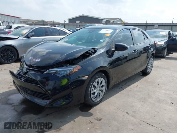 2019 Toyota Corolla L z VIN 5YFBURHE7KP905555, wystawiony jako IAAI lot #41943232 z przebiegiem 83 213 mil mil oraz . Historia ofert i sprzedaży dostępna na DreamBid. Obrazek 2.