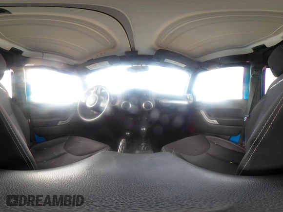 2015 Jeep Wrangler Unlimited Rubicon with VIN 1C4BJWFG5FL558348, listed as a IAAI auction lot 41460025 with 106,012 mi miles. Bid and sale history available at carsss.com. Image 18.