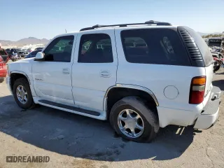 2002 GMC Yukon Denali with VIN 1GKEK63UX2J183619, listed as a Copart auction lot 74744354 with 155,188 mi miles and Salvage Title. Bid and sale history available at carsss.com. Image 2.