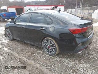 2023 Kia Forte GT with VIN 3KPF44AC4PE607003, listed as a IAAI auction lot 41628064 with 33,844 mi miles and . Bid and sale history available at carsss.com. Image 3.