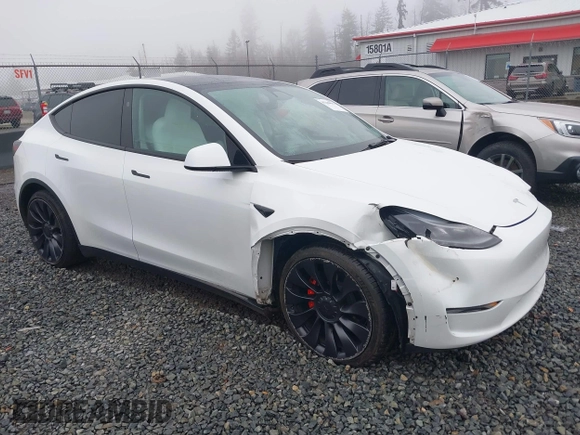 2023 Tesla Model Y Performance z VIN 7SAYGDEF2PF917295, wystawiony jako IAAI lot #41260852 z przebiegiem 23 295 mil mil oraz . Historia ofert i sprzedaży dostępna na DreamBid. Obrazek 1.