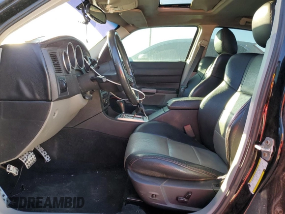 2007 Dodge Charger SRT-8 with VIN 2B3KA73WX7H709265, listed as a Copart auction lot 78547114 with 82,130 mi miles and Salvage Title. Bid and sale history available at DreamBid. Image 7.