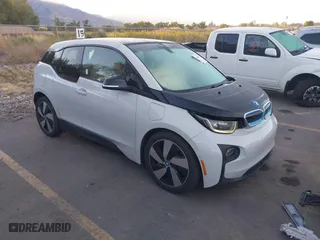 2015 BMW i3 with VIN WBY1Z4C52FV503063, listed as a IAAI auction lot 40644359 with 77,009 mi miles. Bid and sale history available at carsss.com. Image 1.