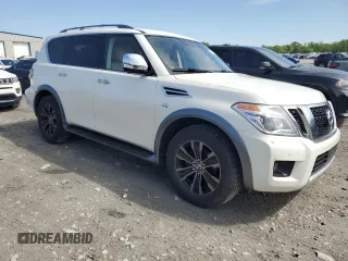 2018 Nissan Armada Platinum with VIN JN8AY2NE8J9732438, listed as a Copart auction lot 56233785 with 122,870 mi miles and Salvage title. Bid and sale history available at DreamBid. Image 4.