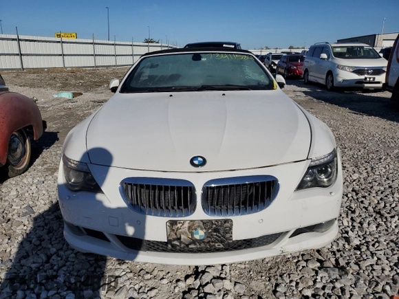 2010 BMW 6 Series 650i z VIN WBAEB5C50AC224807, wystawiony jako Copart lot #73411584 z przebiegiem 112 734 mil mil oraz Szkoda całkowita • Salvage title. Historia ofert i sprzedaży dostępna na DreamBid. Obrazek 5.