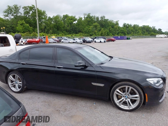 2014 BMW 7 Series 740Li with VIN WBAYE4C51ED138744, listed as a IAAI auction lot 42254213 with 116,157 mi miles and . Bid and sale history available at DreamBid. Image 13.
