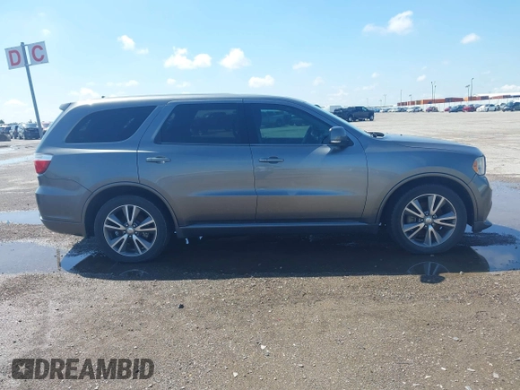 2013 Dodge Durango R/T z VIN 1C4SDHCT7DC564802, wystawiony jako IAAI lot #42348957 z przebiegiem 178 354 mil mil oraz . Historia ofert i sprzedaży dostępna na DreamBid. Obrazek 13.