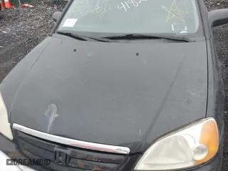 2001 Honda Civic LX with VIN 2HGES16511H554283, listed as a IAAI auction lot 41820187 with 999,999 mi miles. Bid and sale history available at carsss.com. Image 10.