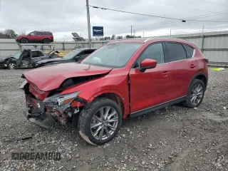 2021 Mazda CX-5 Grand Touring Reserve with VIN JM3KFBAY5M0313517, listed as a Copart auction lot 42815805 with 34,028 mi miles and Salvage Title. Bid and sale history available at carsss.com. Image 1.