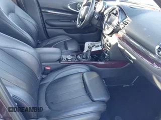 2016 MINI Clubman z VIN WMWLN5C50G2E29740, wystawiony jako IAAI lot #41345976 z przebiegiem 67 124 mil mil oraz . Historia ofert i sprzedaży dostępna na DreamBid. Obrazek 5.