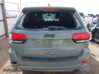 2021 Jeep Grand Cherokee Laredo X with VIN 1C4RJEAG5MC824738, listed as a IAAI auction lot 41580995 with 57,923 mi miles. Bid and sale history available at carsss.com. Image 17.