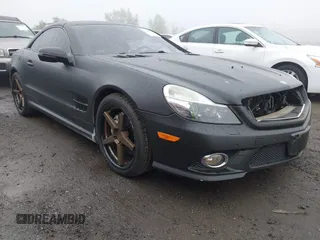 2011 Mercedes-Benz SL 550 z VIN WDBSK7BA0BF164803, wystawiony jako IAAI lot #42495147 z przebiegiem 63 616 mil mil oraz . Historia ofert i sprzedaży dostępna na DreamBid. Obrazek 1.