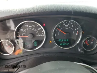 2016 Jeep Wrangler Unlimited Sport z VIN 1C4BJWDG5GL179046, wystawiony jako Copart lot #52989725 z przebiegiem 129 051 mil mil oraz Szkoda całkowita • Salvage title. Historia ofert i sprzedaży dostępna na DreamBid. Obrazek 9.